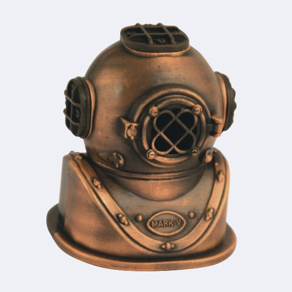 A bronze-colored pencil sharpener designed to resemble a vintage diving helmet with the name Mark V inscribed.