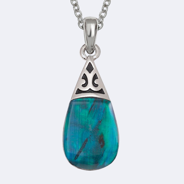 A pear drop necklace with a blue Paua shell pendant, attached to a trace chain.