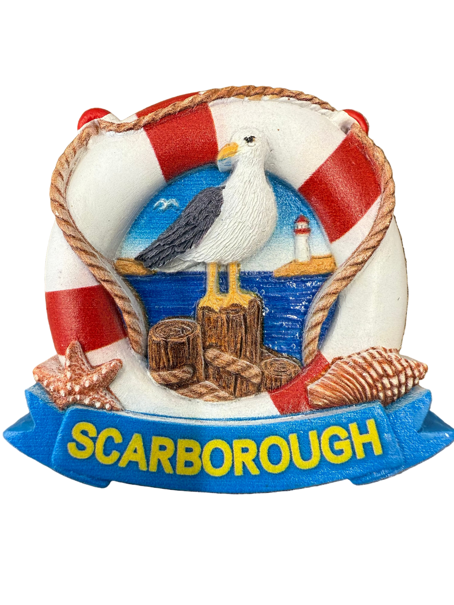 Decorative magnet with a seagull, life buoy, and lighthouse