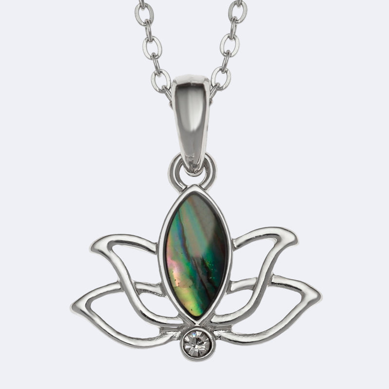 Silver lotus flower pendant with a green stone on a white background