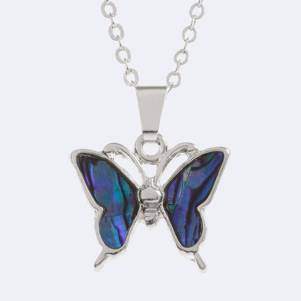 A purple butterfly necklace with a Paua shell pendant on a silver trace chain.