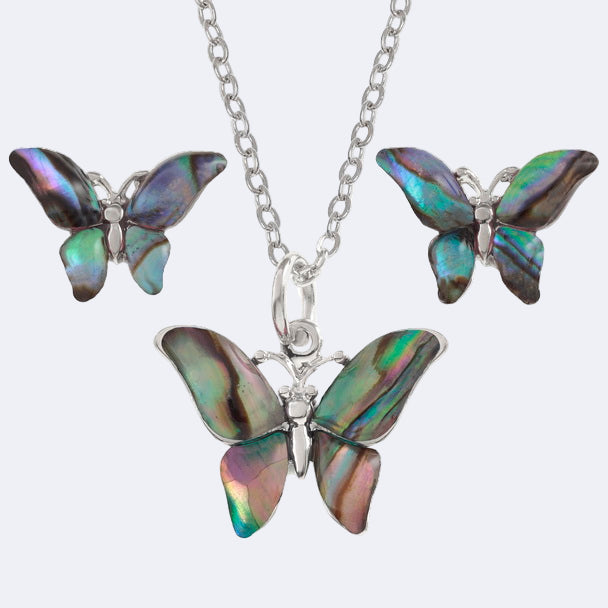 A set of jewelry featuring a butterfly pendant necklace and matching stud earrings, with the pendant displayed in front of a chain.
