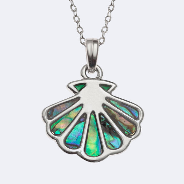 A silver-colored scallop shell necklace with a paua shell pendant, displayed on a chain.