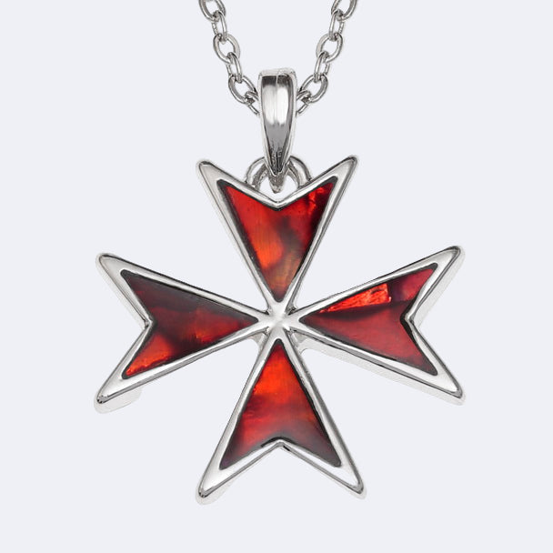 Star-shaped pendant with red inlay on a silver chain against a white background