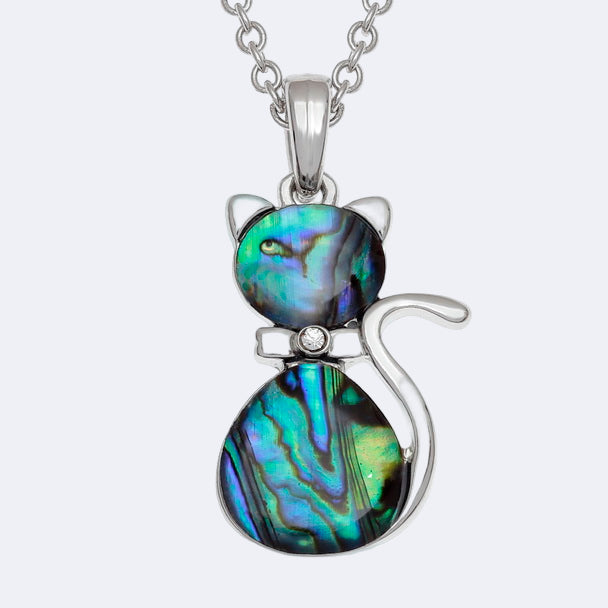 A silver-colored cat-shaped necklace with a natural Paua shell pendant on a chain, presented against a white background.