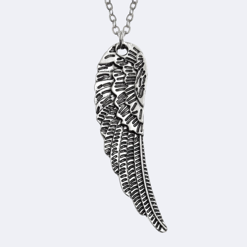 Silver angel wing necklace on a white background