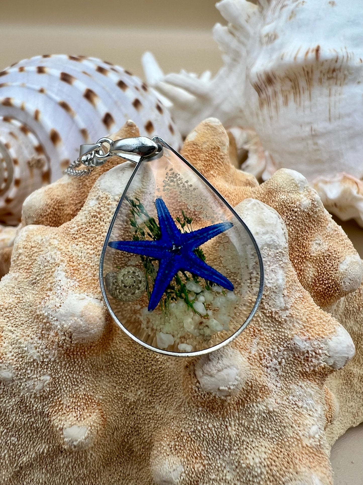 Starfish and seashell teardrop necklace