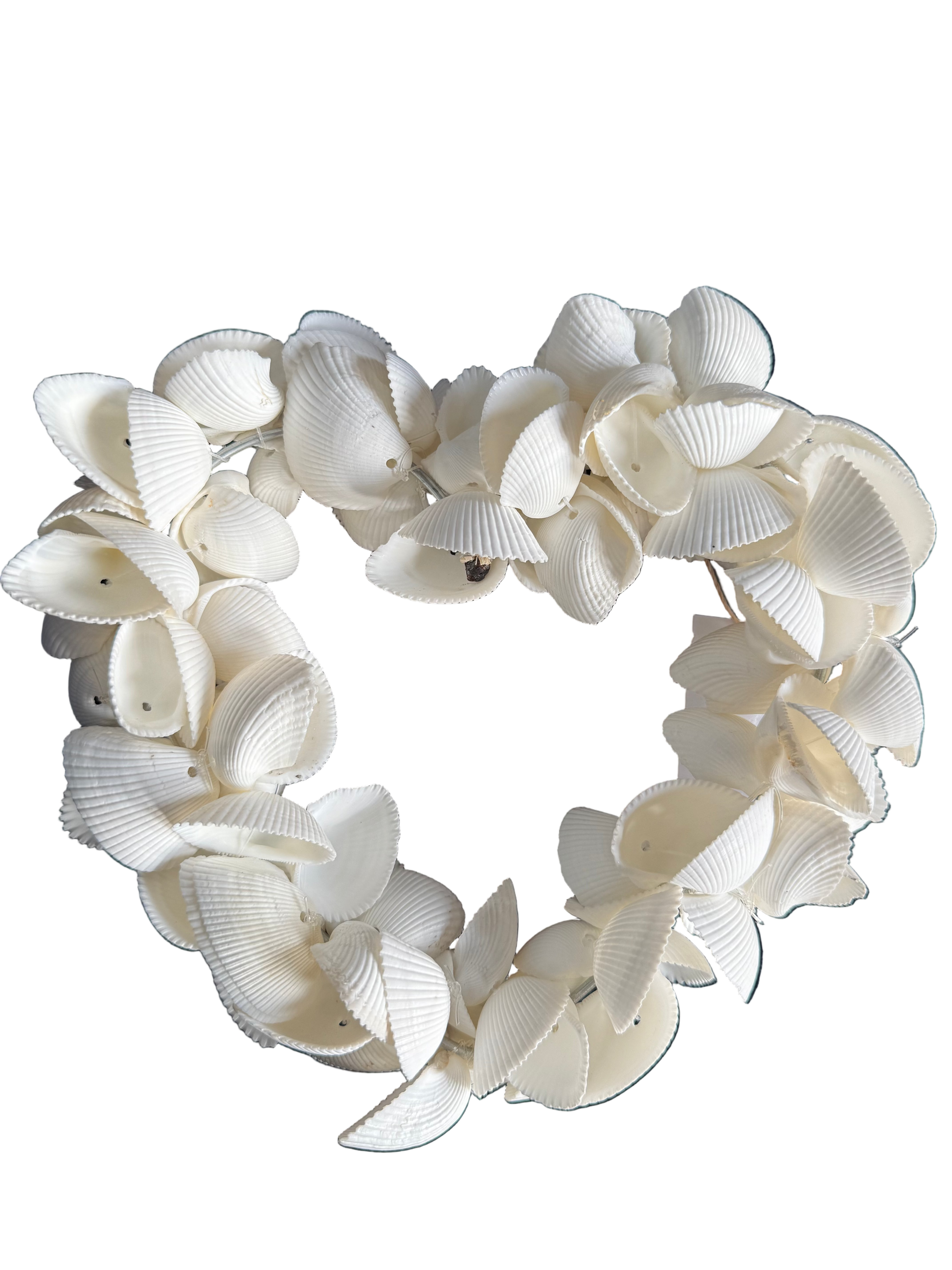 White shell wreath on a dark blue background