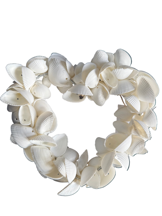 White shell wreath on a dark blue background
