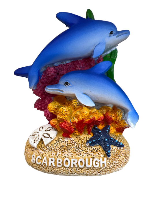 Decorative item with two blue dolphins on a coral reef, featuring the word 'Scarborough'.