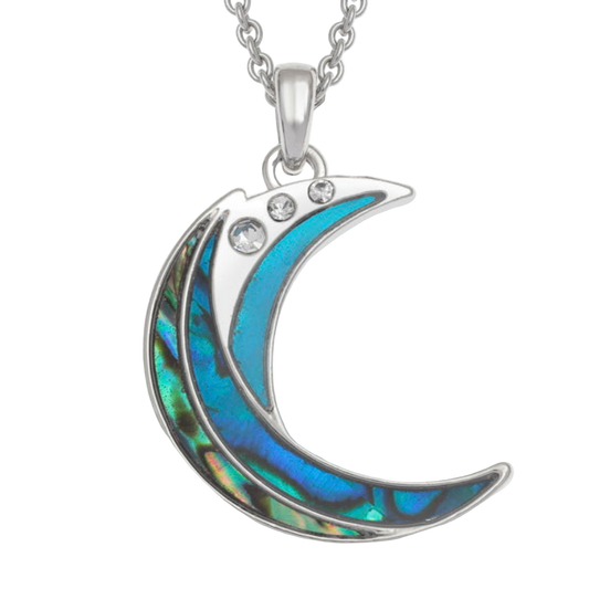 Crescent moon-shaped pendant with blue inlay and clear stones on a white background