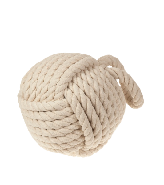 Large ball of beige braided rope on a white background