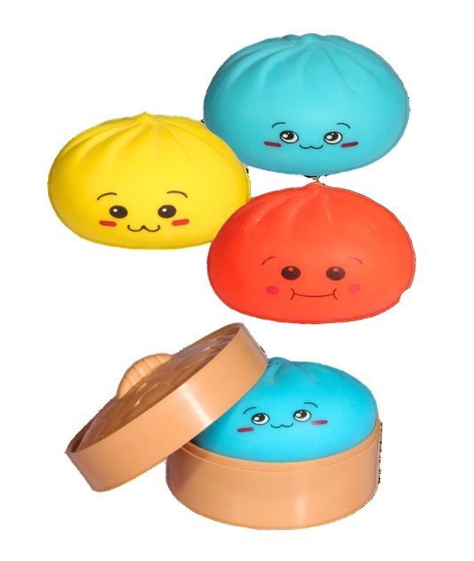 Colorful soft toys shaped like dumplings with faces on a white background