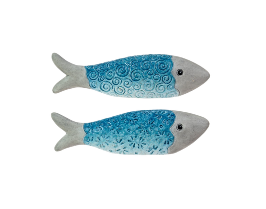 Two blue fish-shaped objects on a white background