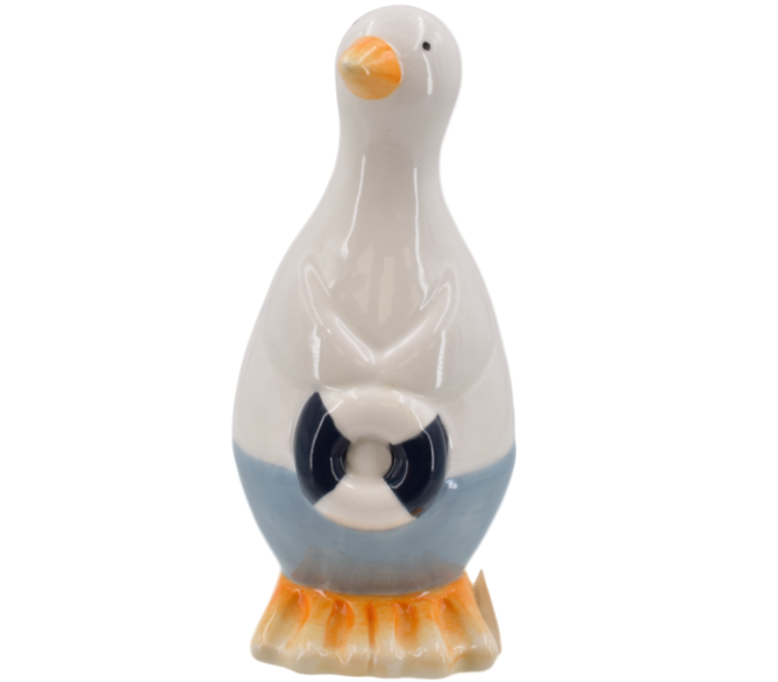 Decorative seagull-shaped ornament with a white body, orange beak, and feet holding a blue and white lifering