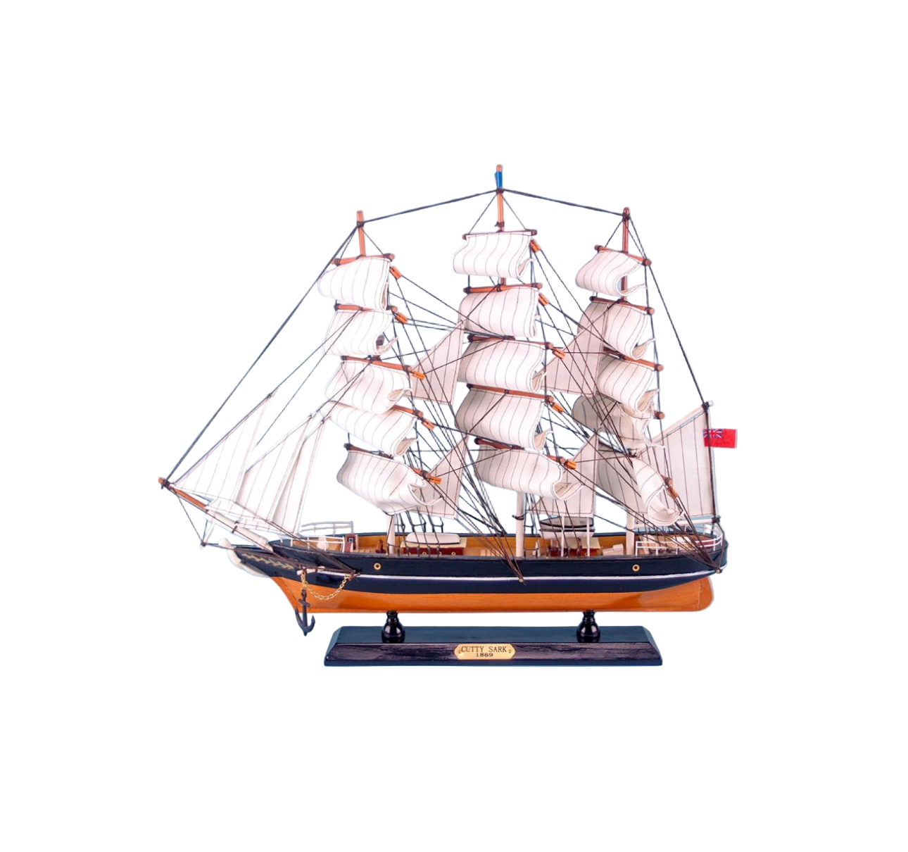 Model ship with multiple sails on a white background