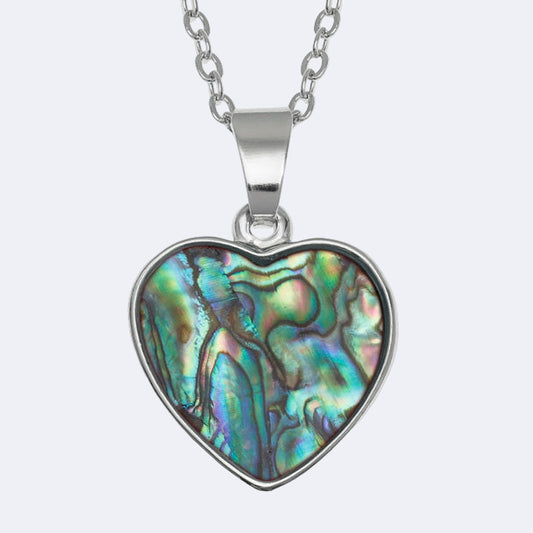 Heart-shaped abalone shell pendant on a silver chain against a white background
