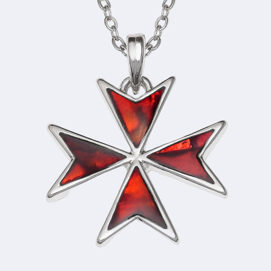 Star-shaped pendant with red inlay on a silver chain against a white background