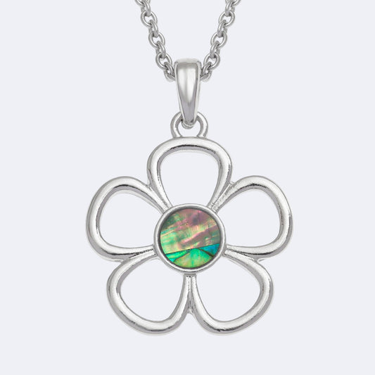 Silver flower-shaped pendant with a green paua shell centre on a white background