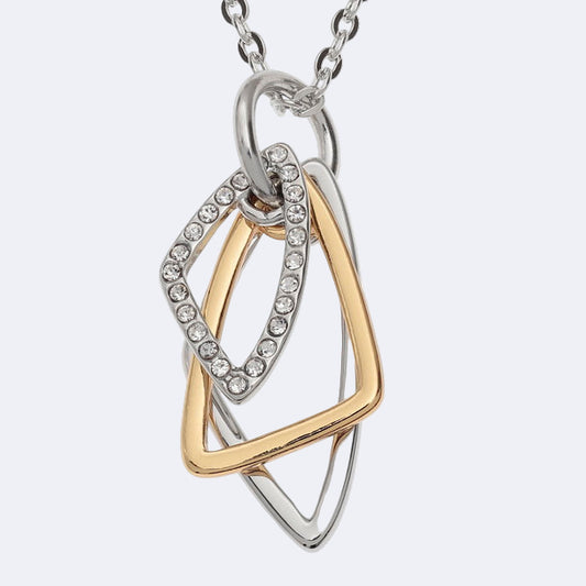 Two-tone necklace with interlocking rings on a white background